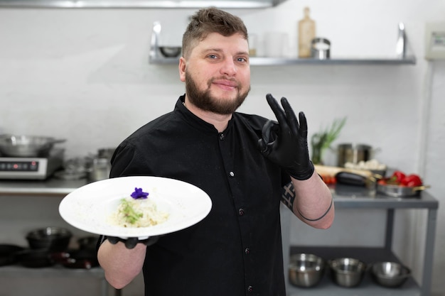 Chef presenting dish
